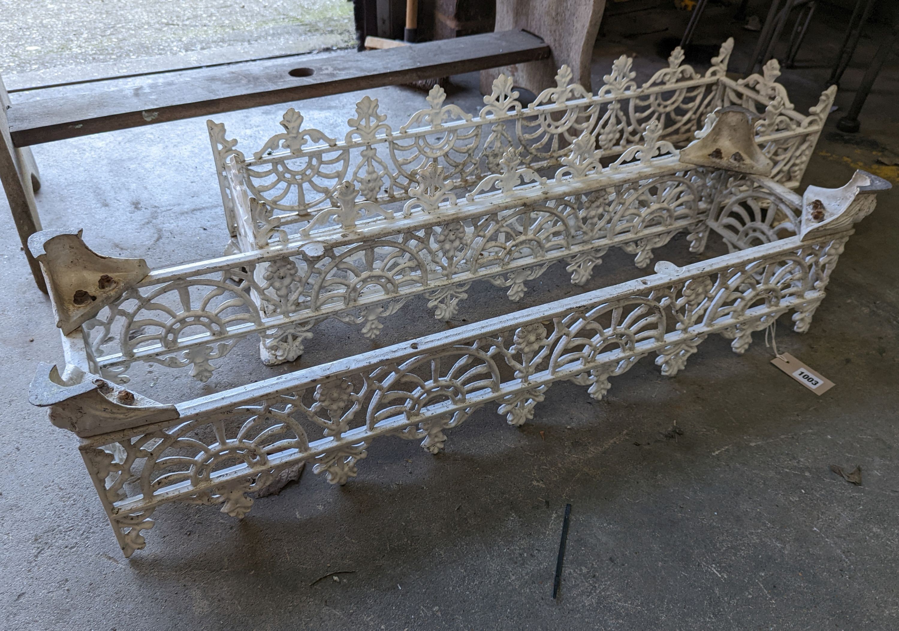 A pair of rectangular Victorian style painted metal garden planter frames (no bases), width 88cm, depth 22cm, height 23cm