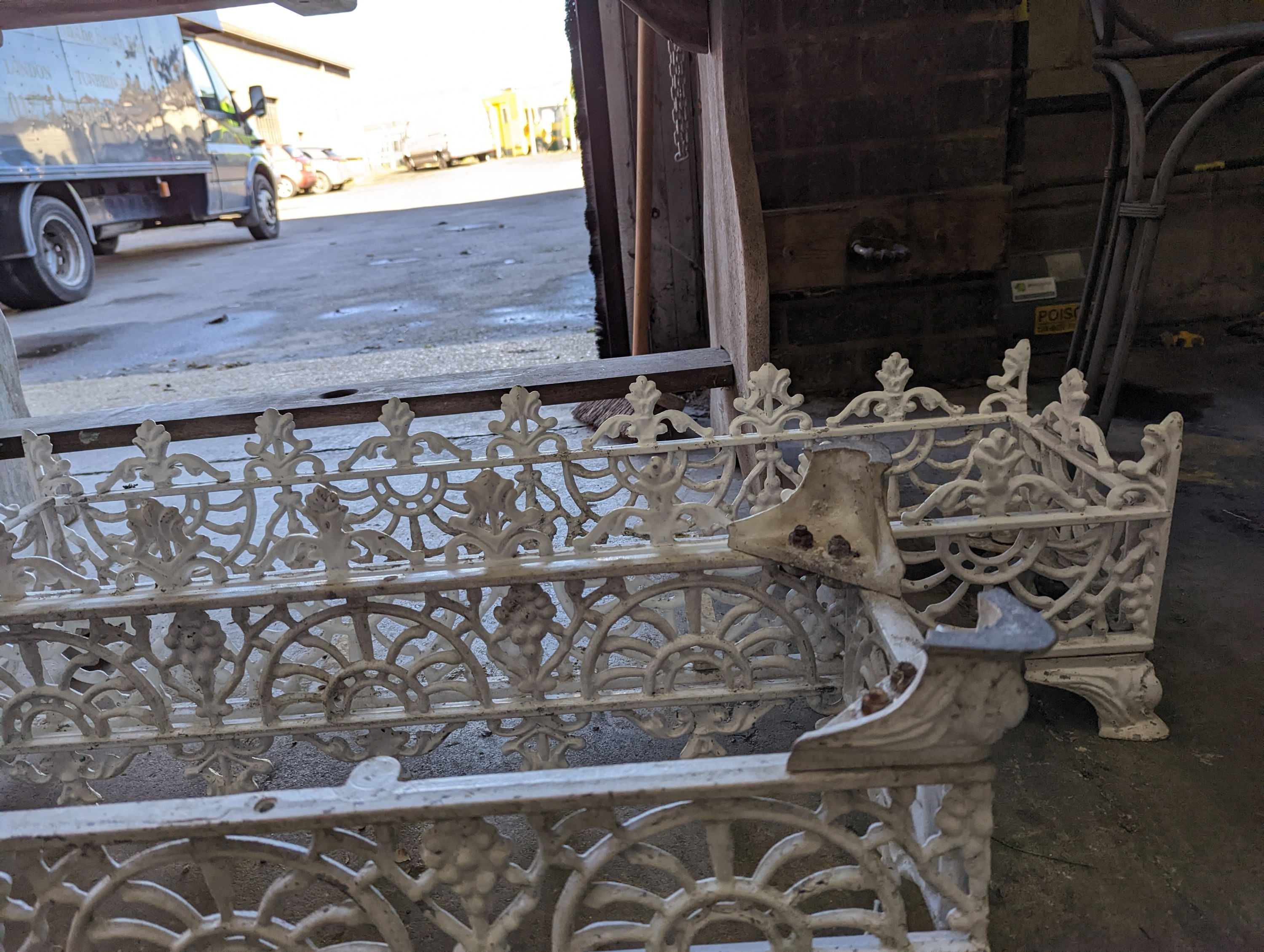 A pair of rectangular Victorian style painted metal garden planter frames (no bases), width 88cm, depth 22cm, height 23cm