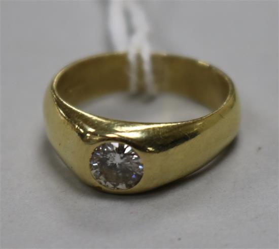 An 18ct gold and gypsy set solitaire diamond ring, size K. An 18ct gold and gypsy set solitaire diamond ring, size K.