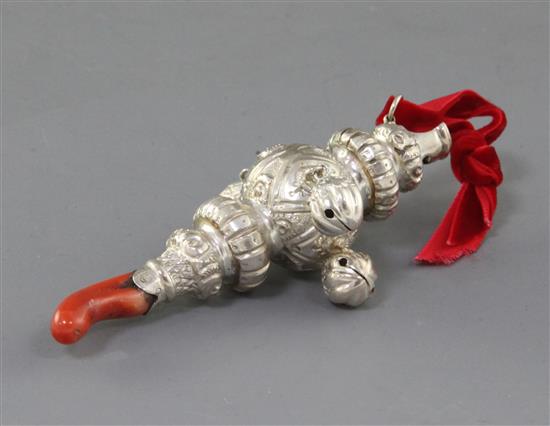 A Victorian silver childs rattle by Colen Hewer Cheshire, 10.3cm. A Victorian silver childs rattle by Colen Hewer Cheshire, 10.3cm.