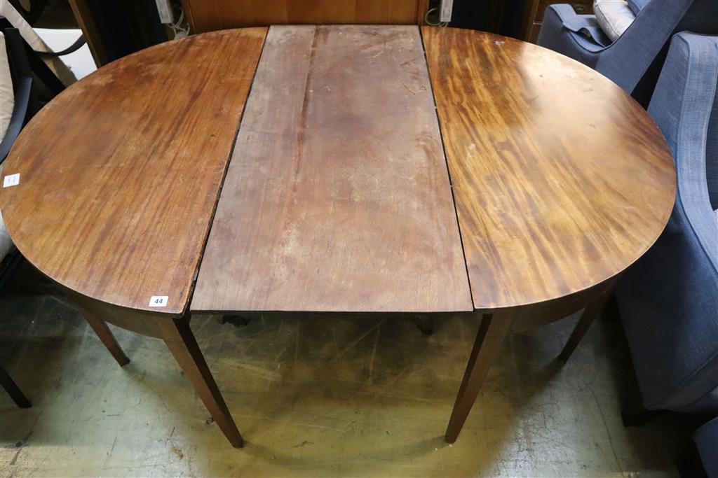 A George III mahogany D end extending dining table, width 164cm, depth 114cm, height 72cm