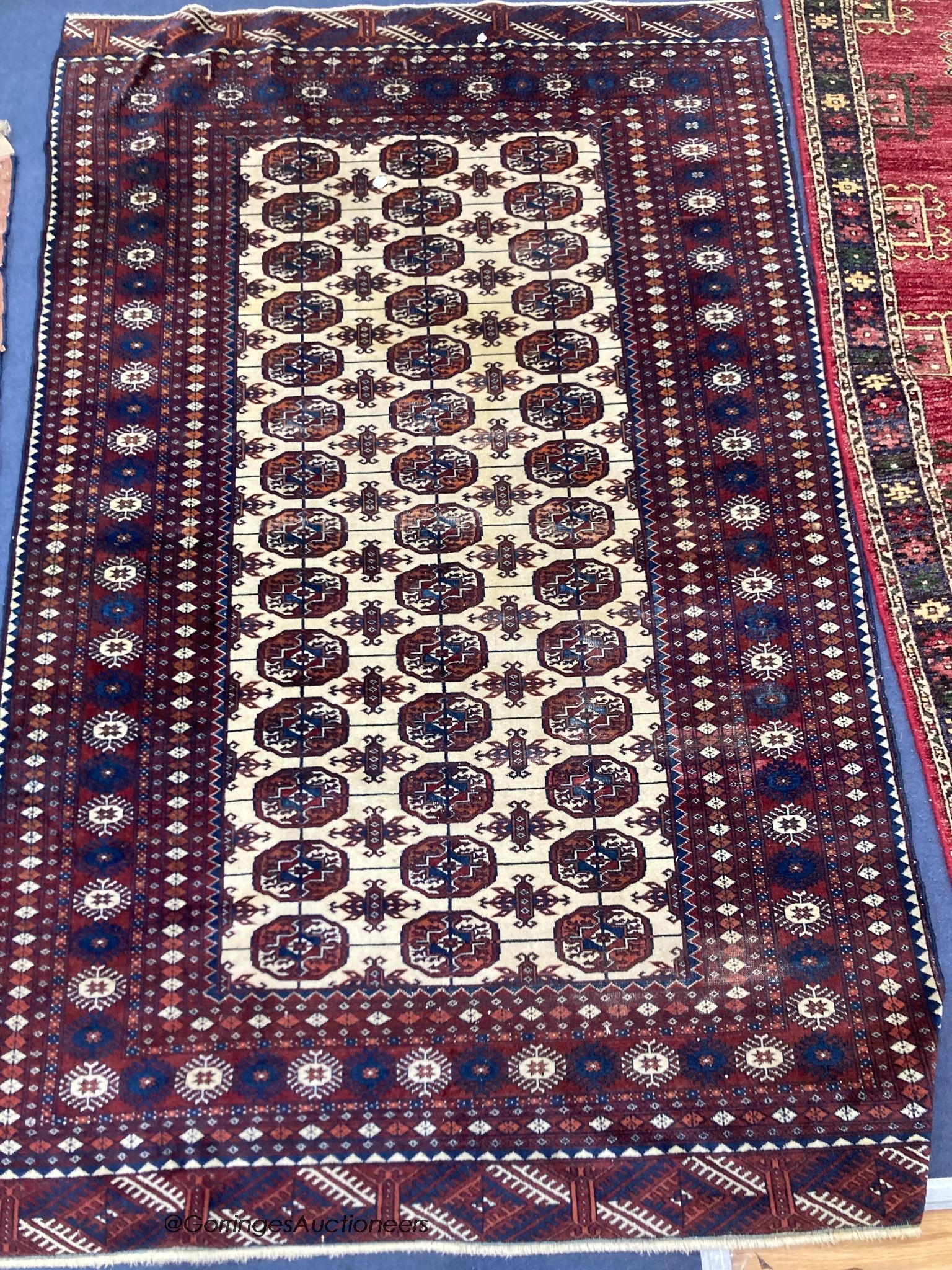A Bokhara ivory ground rug, 190 x 120cm