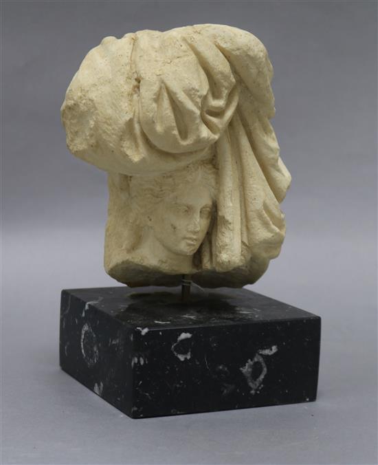 A sculpture on a marble base height 21cm A sculpture on a marble base height 21cm