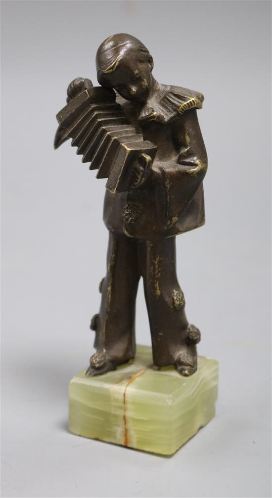A bronze accordion player on onyx base A bronze accordion player on onyx base