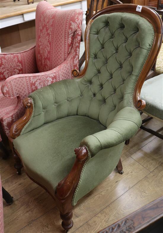 A Victorian mahogany framed buttoned back spoonback armchair A Victorian mahogany framed buttoned back spoonback armchair