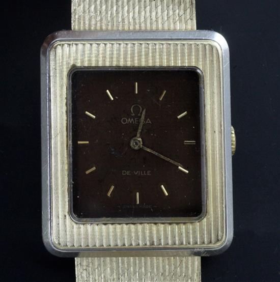 An Omega De Ville 14ct yellow gold and platinum wristwatch, 1970s, with stainless steel back. An Omega De Ville 14ct yellow gold and platinum wristwatch, 1970s, with stainless steel back.