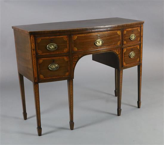 A George III inlaid mahogany bowfront sideboard, W.3ft 8in. D.1ft 9in. H.2ft 10in. A George III inlaid mahogany bowfront sideboard, W.3ft 8in. D.1ft 9in. H.2ft 10in.