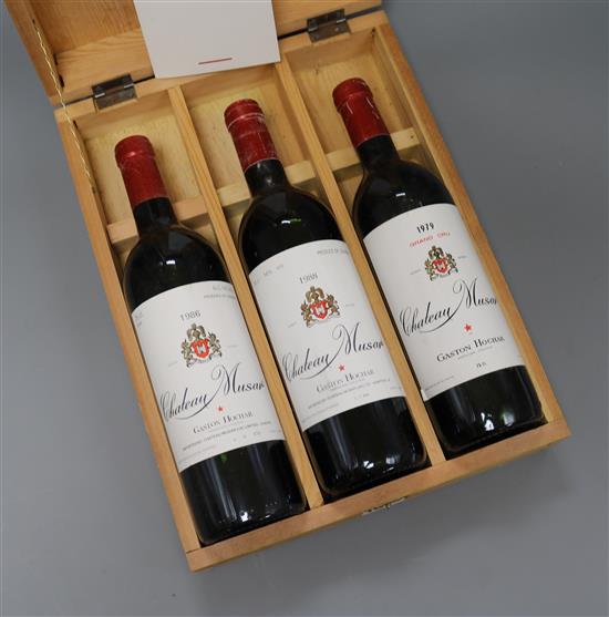 Three bottles of Chateau Muser, 1979, 1986 and 1988, in presentation box