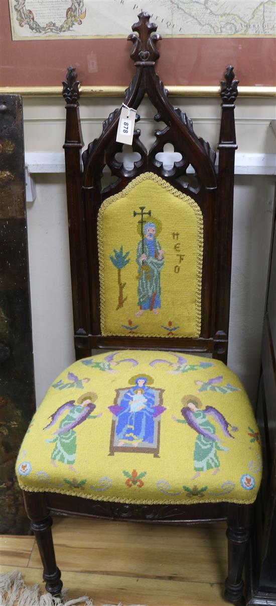 A Victorian rosewood nursing chair in the Gothic Revival manner, A Victorian rosewood nursing chair in the Gothic Revival manner,