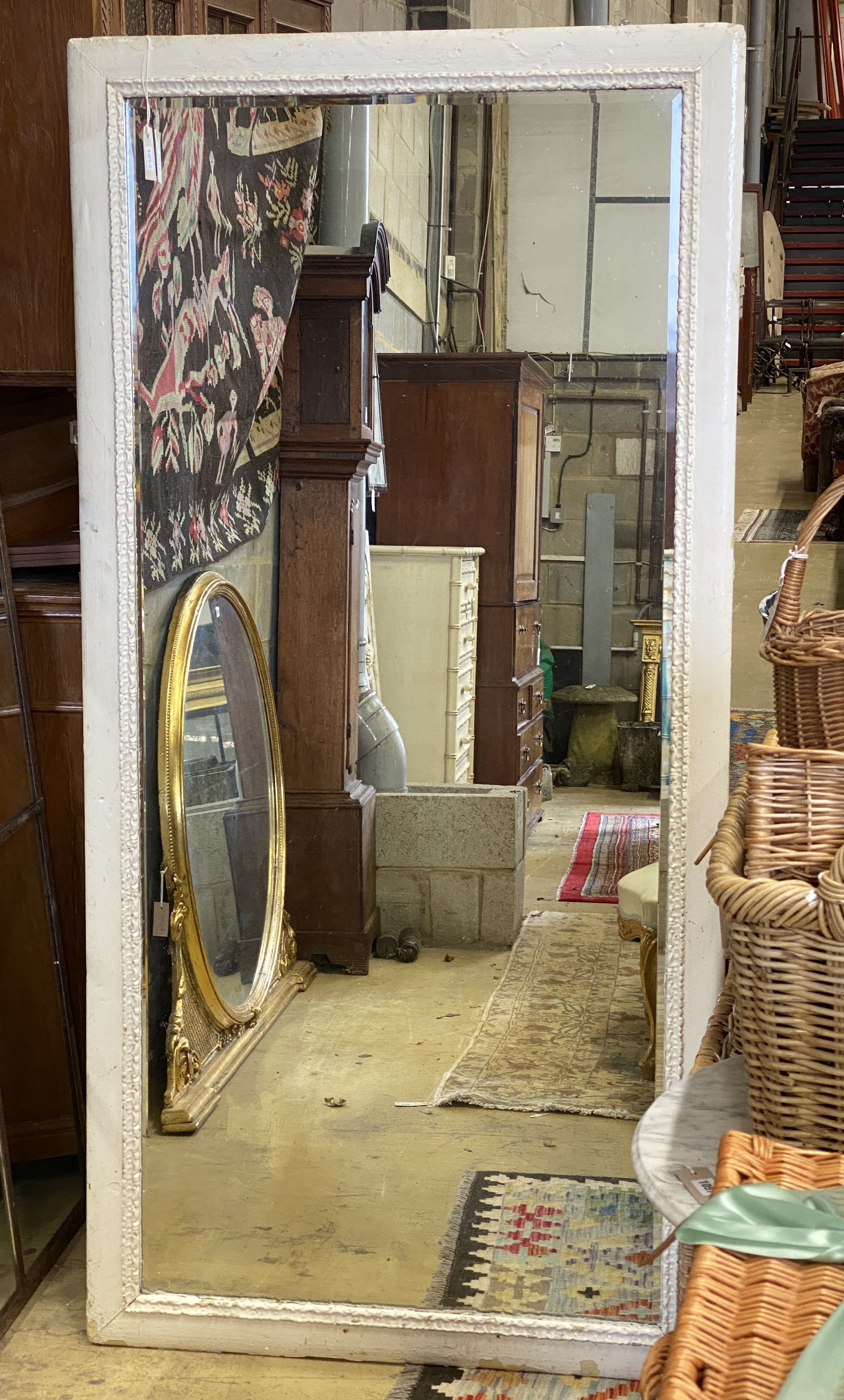A large Victorian rectangular wall mirror with later painted frame, width 92cm, height 189cm