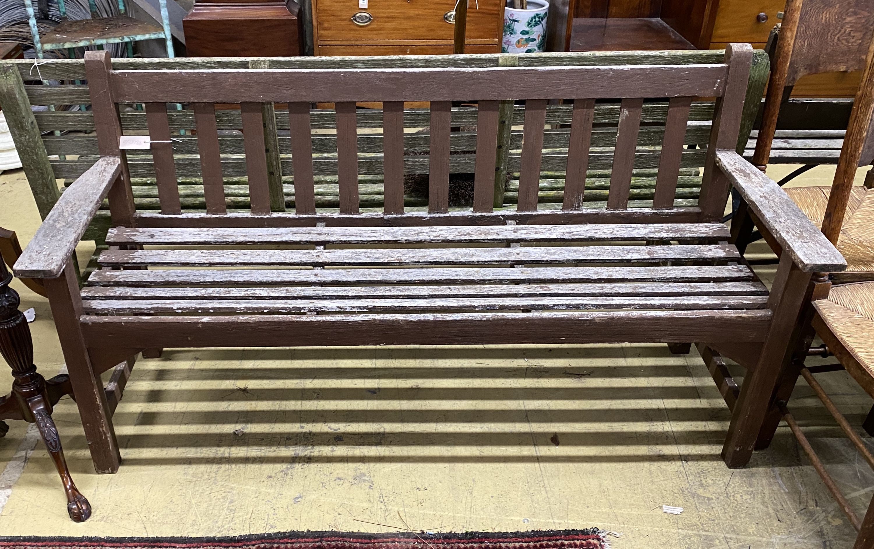 A part painted weathered teak garden bench, length 158cm, depth 56cm, height 84cm
