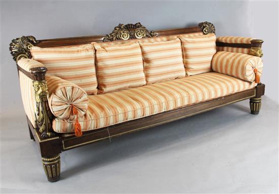 An important Regency parcel gilt rosewood settee in the manner of George Smith W.7ft 6in. D.3ft H.3ft 5in. An important Regency parcel gilt rosewood settee in the manner of George Smith W.7ft 6in. D.3ft H.3ft 5in.