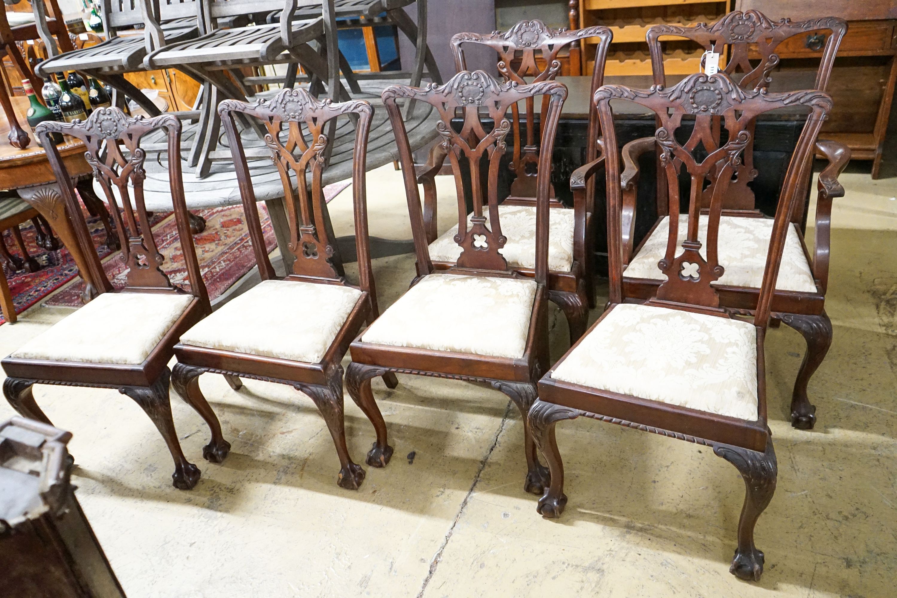A set of six George III style mahogany dining chairs, (two with arms)