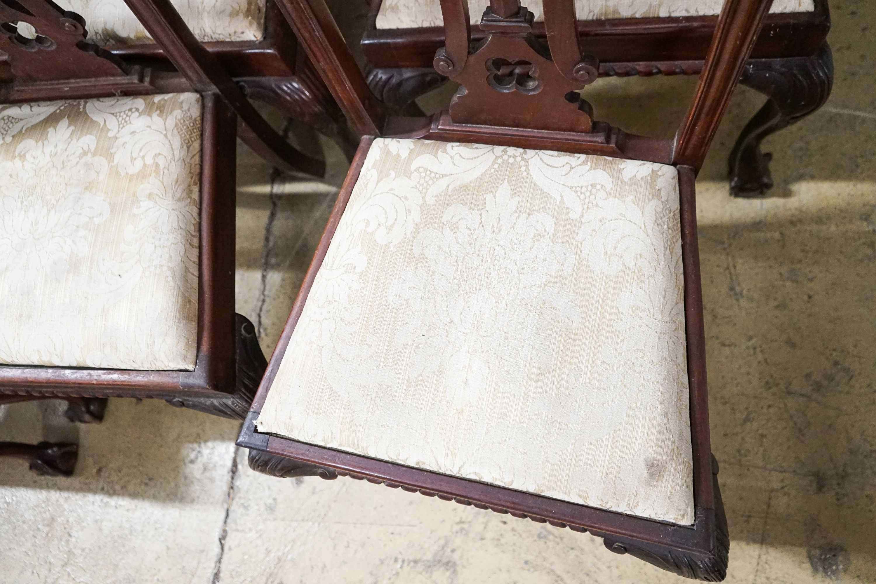 A set of six George III style mahogany dining chairs, (two with arms)
