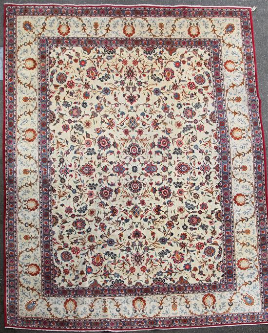 A Kashan ivory ground carpet, 14ft 3in by 10ft 7in. A Kashan ivory ground carpet, 14ft 3in by 10ft 7in.