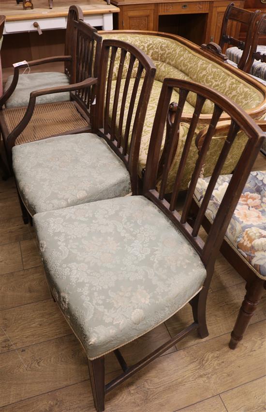 Four George III mahogany dining chairs, one with arms Four George III mahogany dining chairs, one with arms