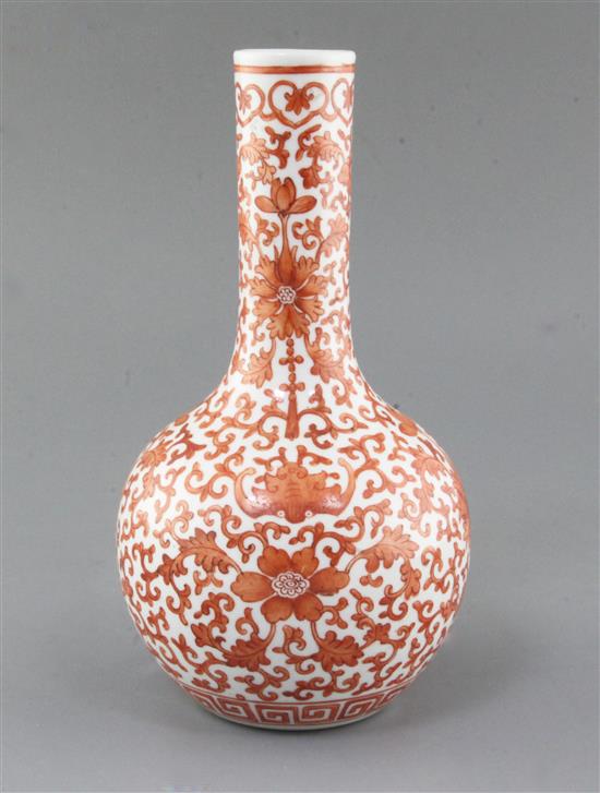A Chinese iron red painted bottle vase, Qianlong mark but late 19th/early 20th century, height 25.8cm A Chinese iron red painted bottle vase, Qianlong mark but late 19th/early 20th century, height 25.8cm