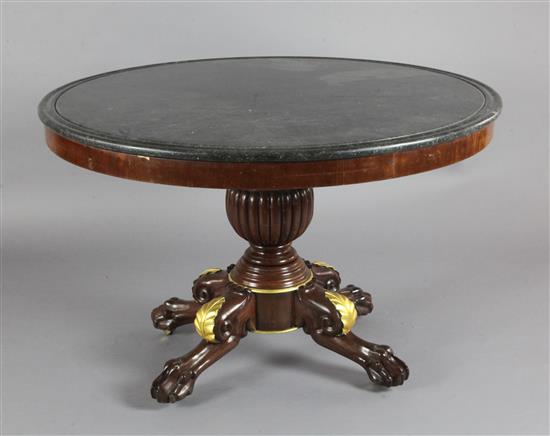 A 19th century French mahogany centre table, Diam.3ft 6in. H.2ft 3in. A 19th century French mahogany centre table, Diam.3ft 6in. H.2ft 3in.