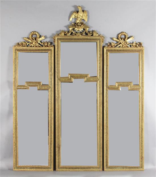 An early 20th century French giltwood and gesso set of three wall mirrors, W.2ft 1in. H.6ft 4in. An early 20th century French giltwood and gesso set of three wall mirrors, W.2ft 1in. H.6ft 4in.