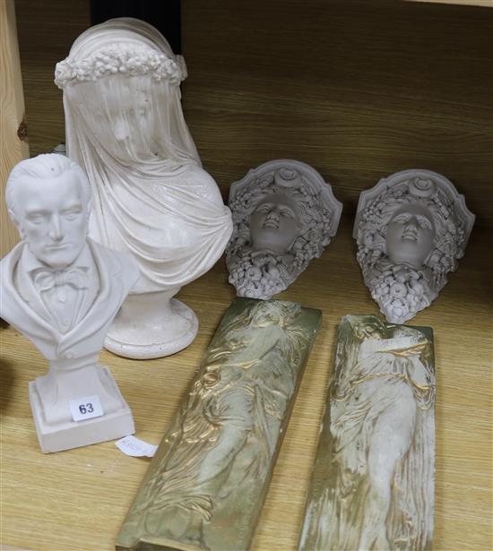 Two plaster busts, a pair of plaster wall shelves and two plaster reliefs Two plaster busts, a pair of plaster wall shelves and two plaster reliefs