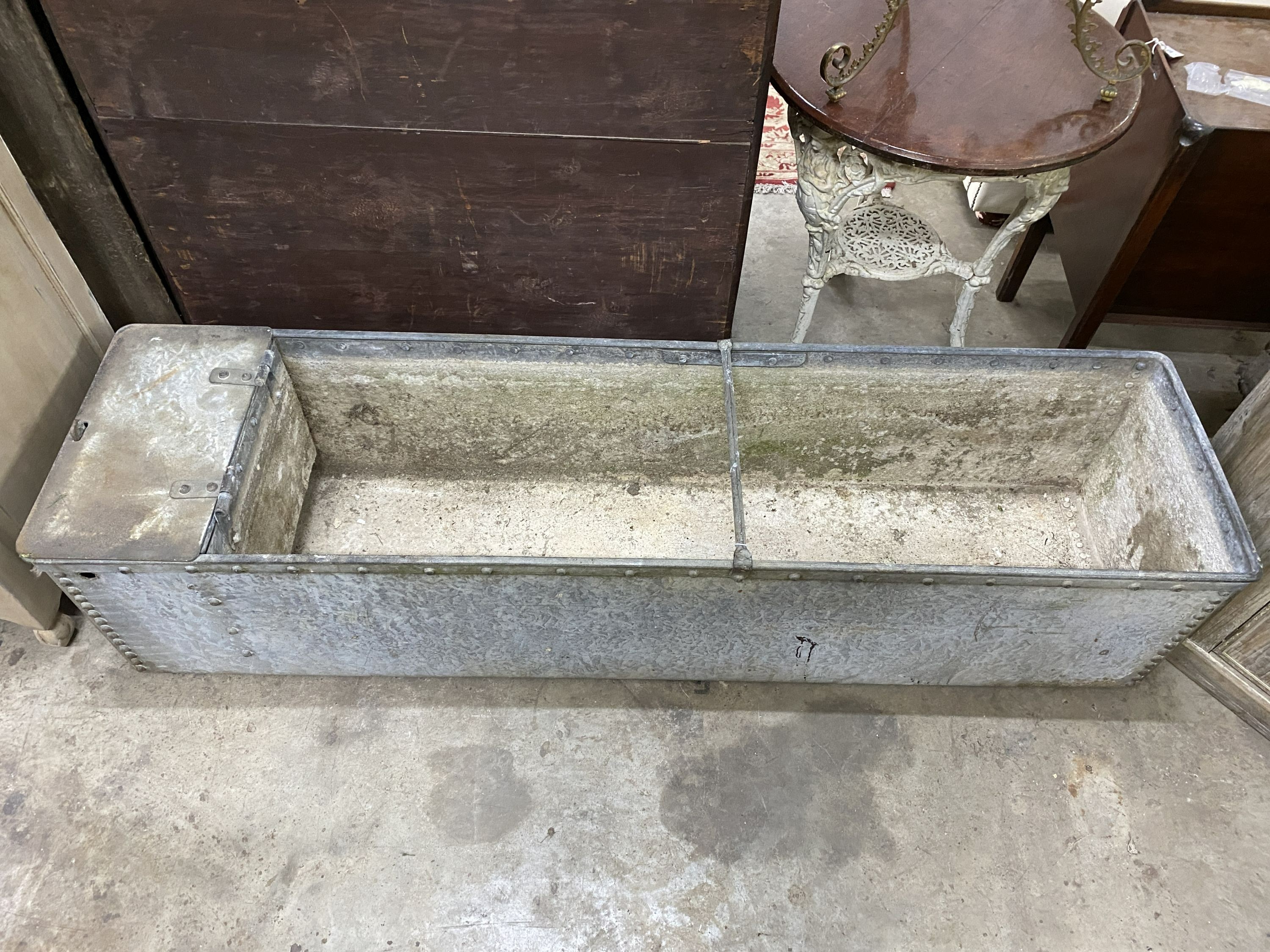 A large vintage galvanised water trough, length 187cm, depth 48cm, height 43cm