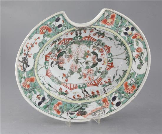 A Chinese export famille verte oval barbers bowl, Kangxi period, width 35.5cm, faults A Chinese export famille verte oval barbers bowl, Kangxi period, width 35.5cm, faults