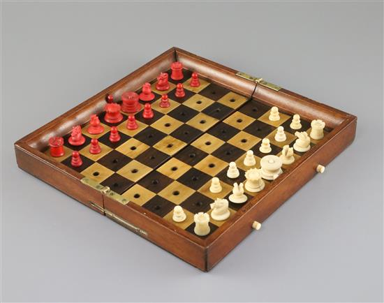 A Jaques & Son In Statu Quo mahogany and boxwood travelling chess set, A Jaques & Son In Statu Quo mahogany and boxwood travelling chess set,