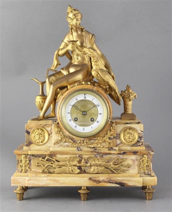 A 19th century French ormolu mounted Sienna marble mantel clock, height 17.75in. A 19th century French ormolu mounted Sienna marble mantel clock, height 17.75in.