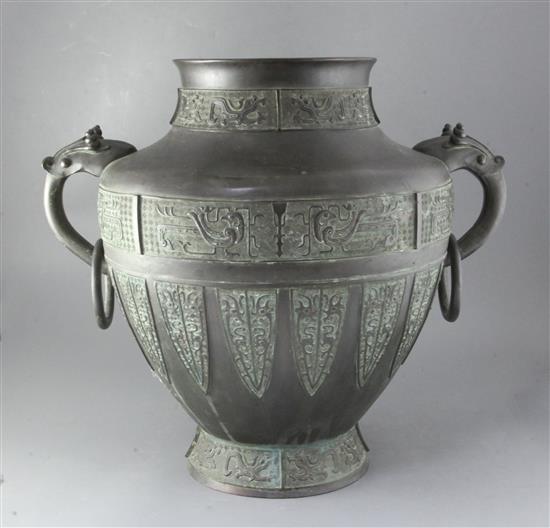 A large Chinese or Japanese archaistic bronze jardiniere, 19th century, height 53cm A large Chinese or Japanese archaistic bronze jardiniere, 19th century, height 53cm