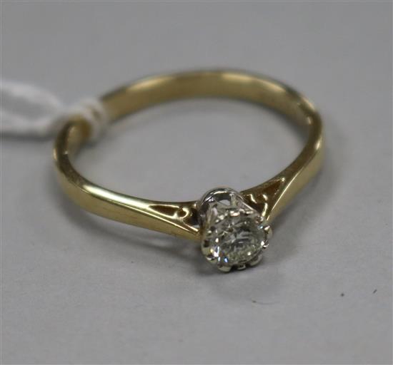 A modern 9ct gold and collet set solitaire diamond ring, size V. A modern 9ct gold and collet set solitaire diamond ring, size V.
