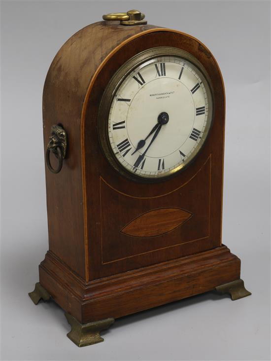 An Edwardian mahogany and inlaid mantel timepiece, height 11in. An Edwardian mahogany and inlaid mantel timepiece, height 11in.