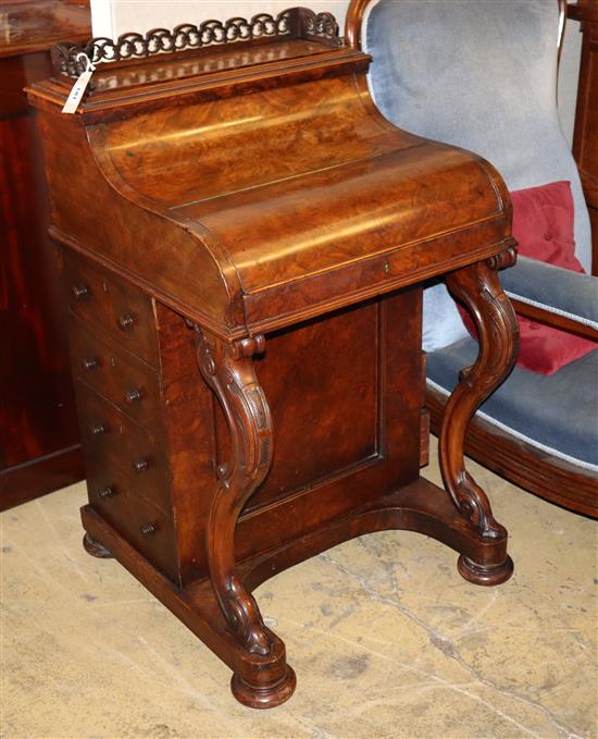 A Victorian burr walnut piano front davenport with rising stationary compartment, W.56cm, D.56cm, H.99cm A Victorian burr walnut piano front davenport with rising stationary compartment, W.56cm, D.56cm, H.99cm