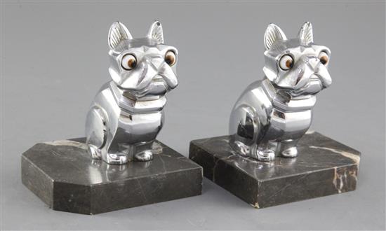 H. Moreau. A pair of Art Deco spelter bookends, modelled as a seated French Bulldog, height 4.25in. H. Moreau. A pair of Art Deco spelter bookends, modelled as a seated French Bulldog, height 4.25in.