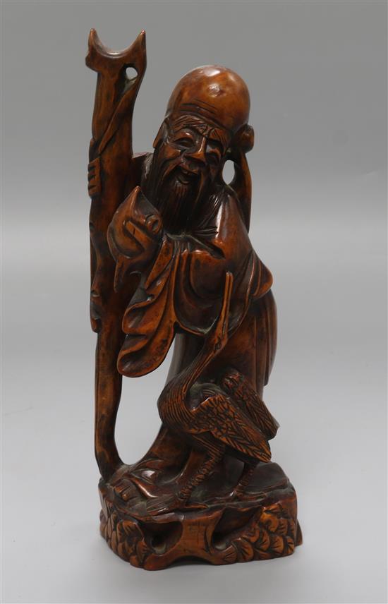 A Chinese rootwood carving of a sage height 24cm A Chinese rootwood carving of a sage height 24cm