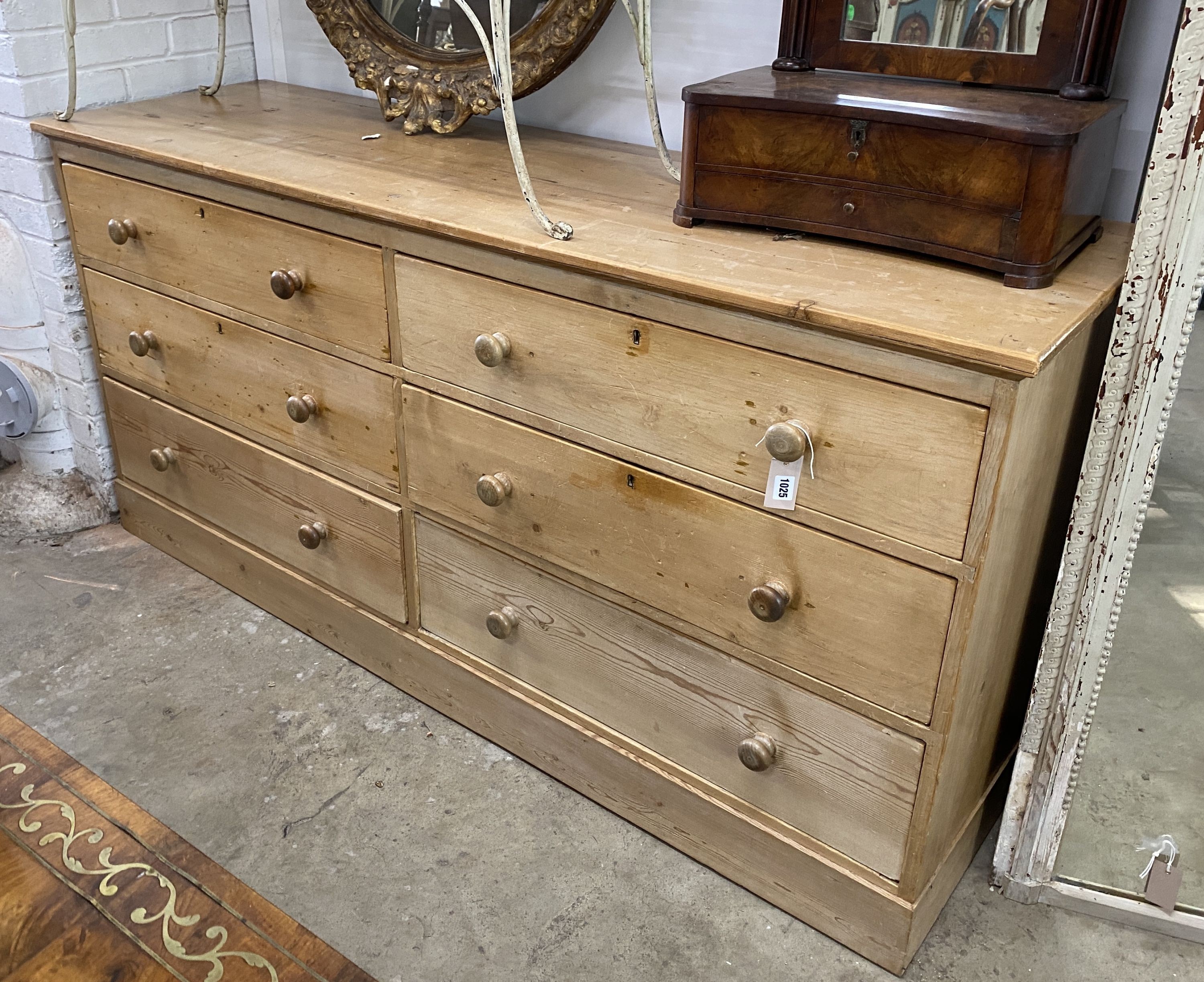 A late Victorian pine six drawer chest, width 182cm, depth 54cm, height 89cm