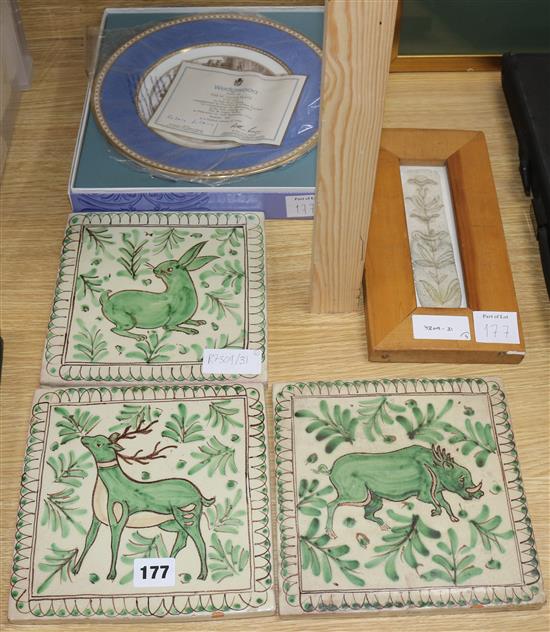 Three Alessi tiles, a framed tile and a Wedgwood plate Three Alessi tiles, a framed tile and a Wedgwood plate