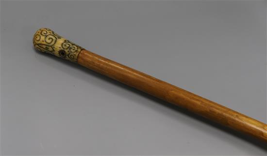 A pique work ivory handled cane, George III length 92cm A pique work ivory handled cane, George III length 92cm