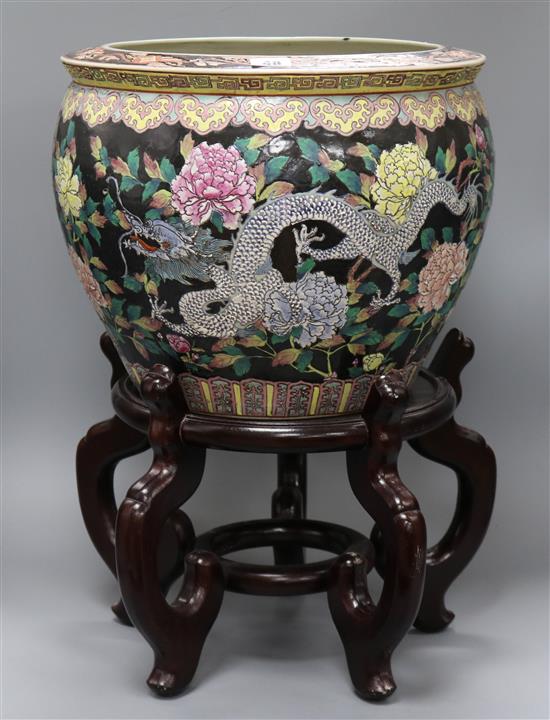 A Chinese fish bowl and stand overall height 54cm