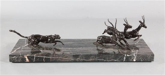 § Jonathan Kenworthy (1943-). A bronze group of Cheetah chasing Grants Gazelles, height 10.5in. length 39in. depth 14in. § Jonathan Kenworthy (1943-). A bronze group of Cheetah chasing Grants Gazelles, height 10.5in. length 39in. depth 14in.