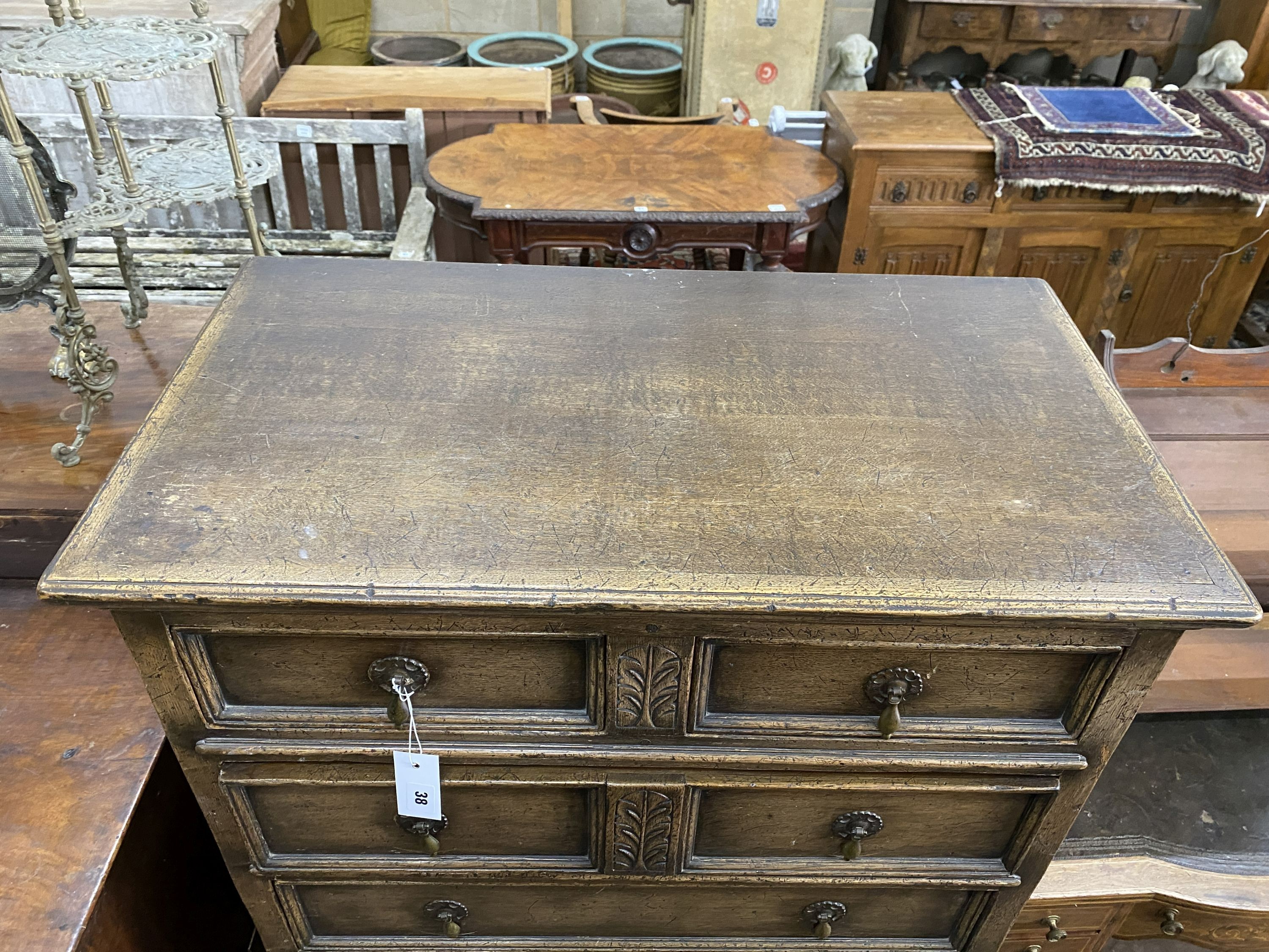 An early 20th century oak chest on chest, width 79cm, depth 45cm, height 140cm