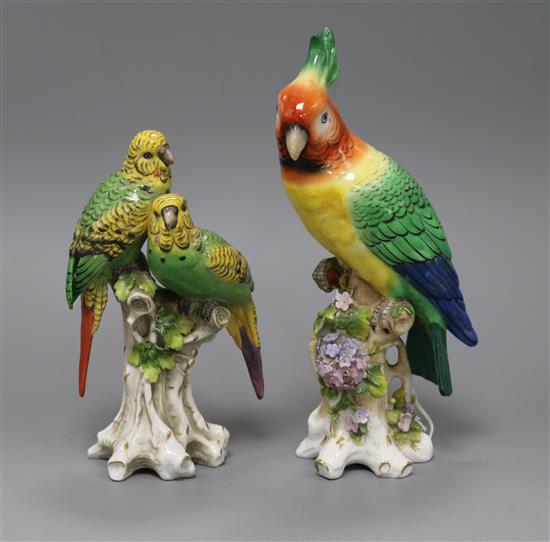 A Sitzendorf parrot and a Crown Naples group of budgerigars tallest 25cm