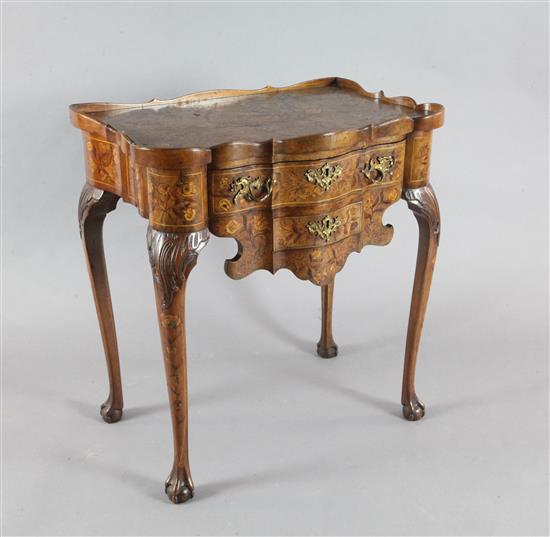 A late 18th century Dutch walnut and marquetry serpentine side table, W.2ft 4in. D.1ft 5in. H.2ft 6in. A late 18th century Dutch walnut and marquetry serpentine side table, W.2ft 4in. D.1ft 5in. H.2ft 6in.