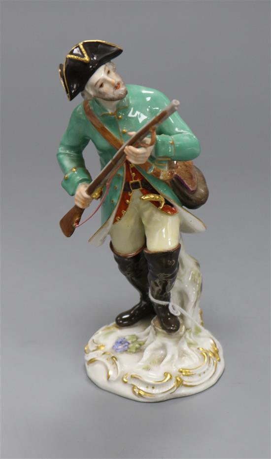 A Meissen figure of a gentleman holding a rifle, height 17cm