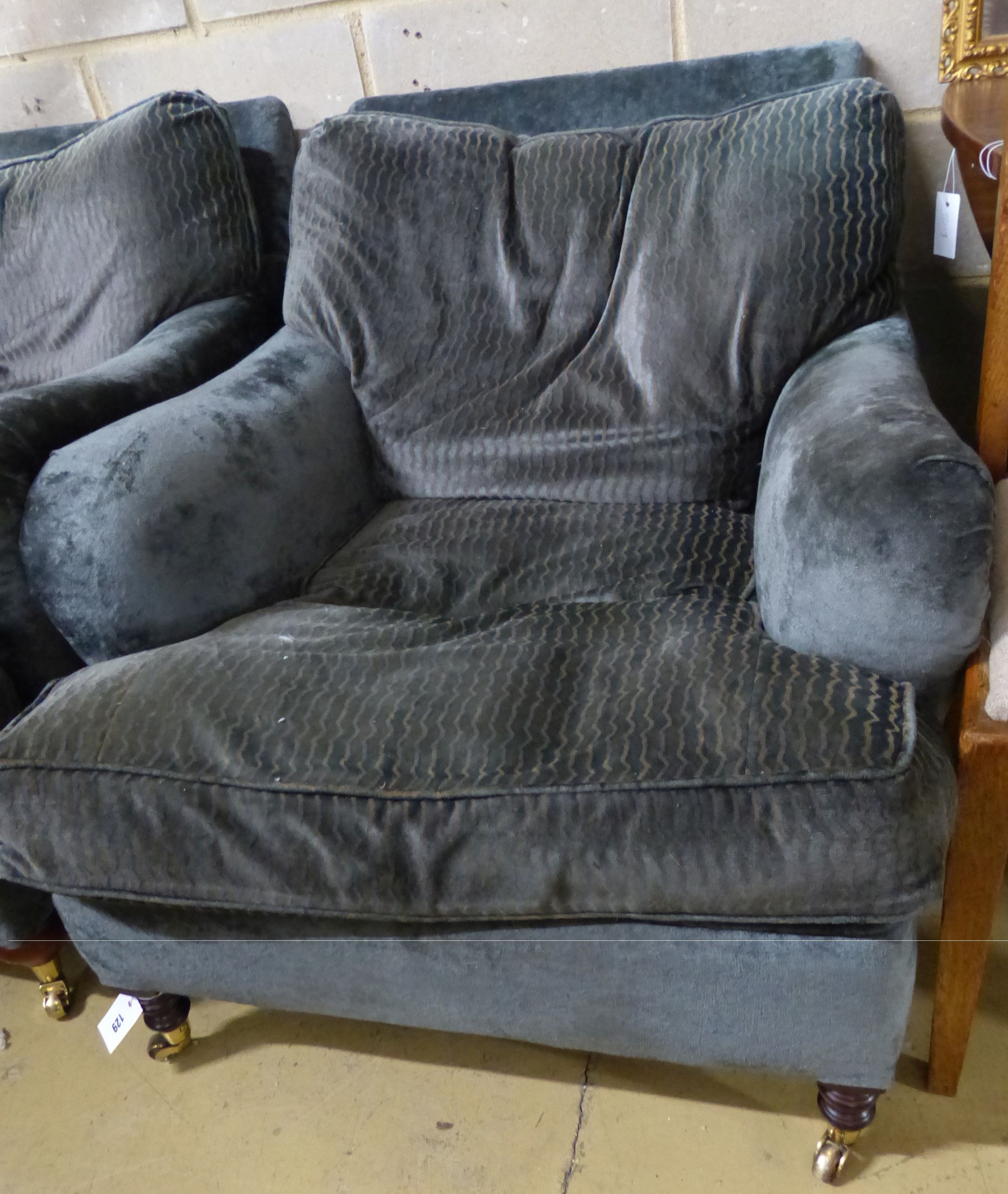 A George Smith armchair, re upholstered and on later feet