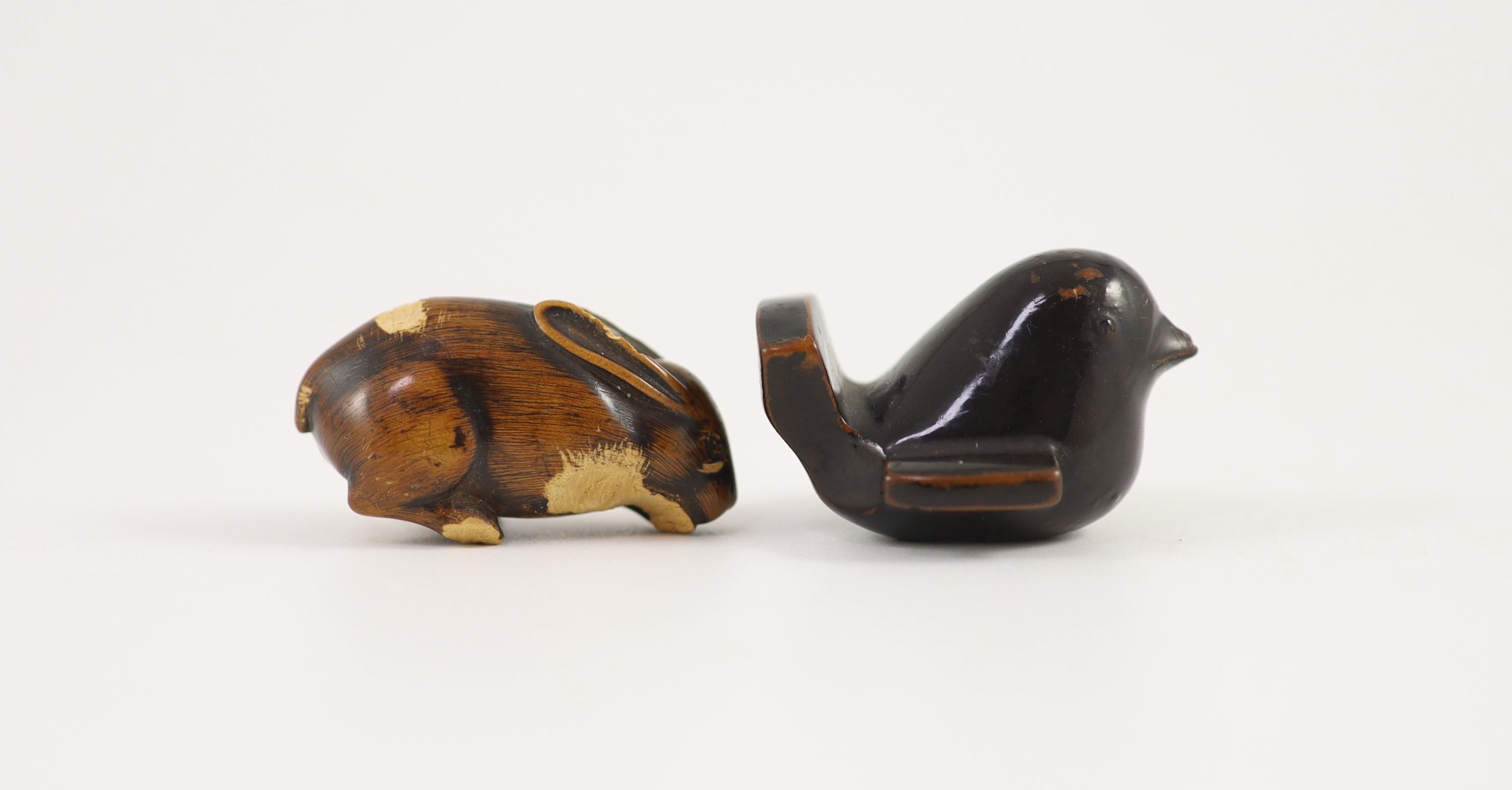 A Japanese lacquered wood netsuke of a bird and a wooden netsuke of a rabbit, 18th/19th century
