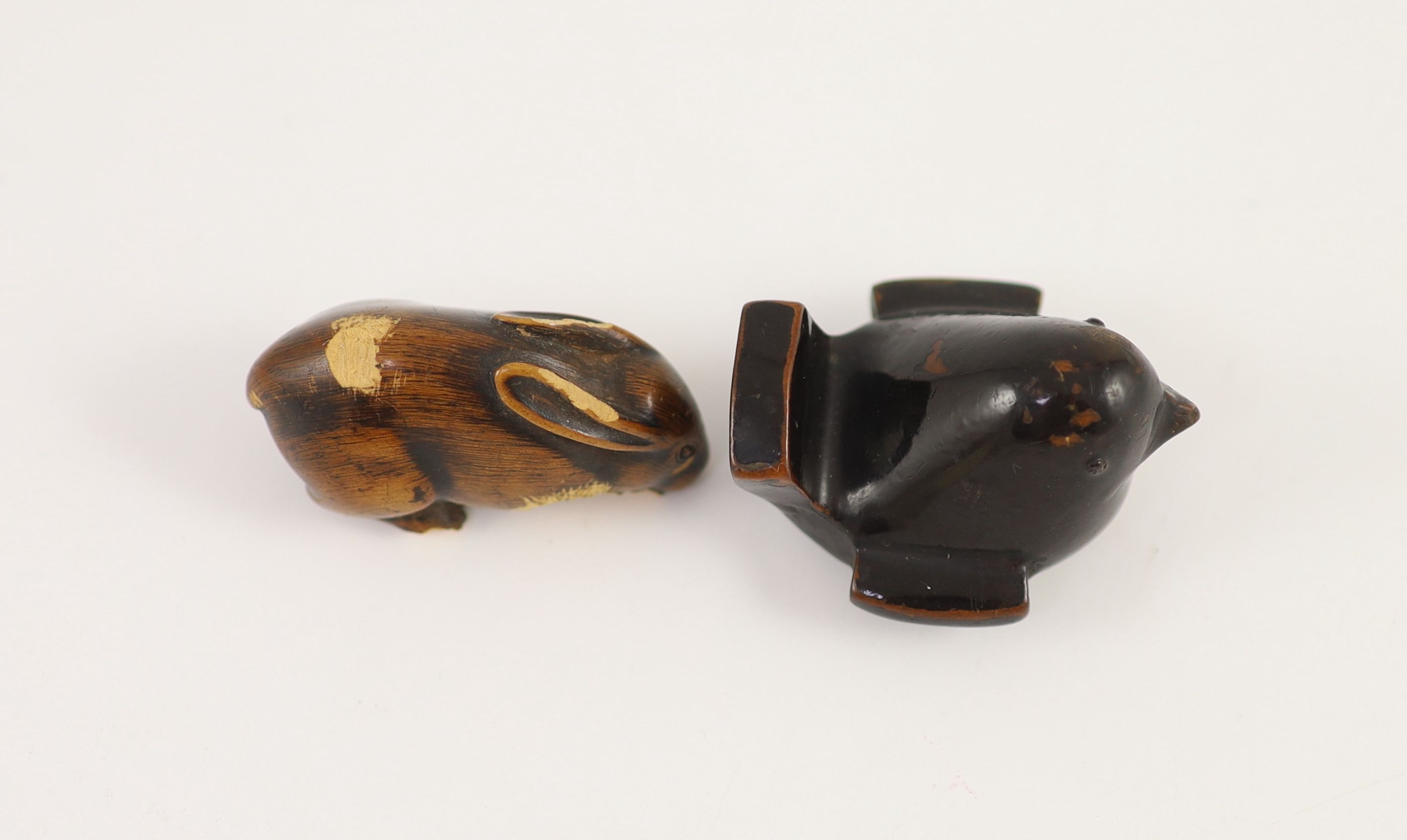 A Japanese lacquered wood netsuke of a bird and a wooden netsuke of a rabbit, 18th/19th century