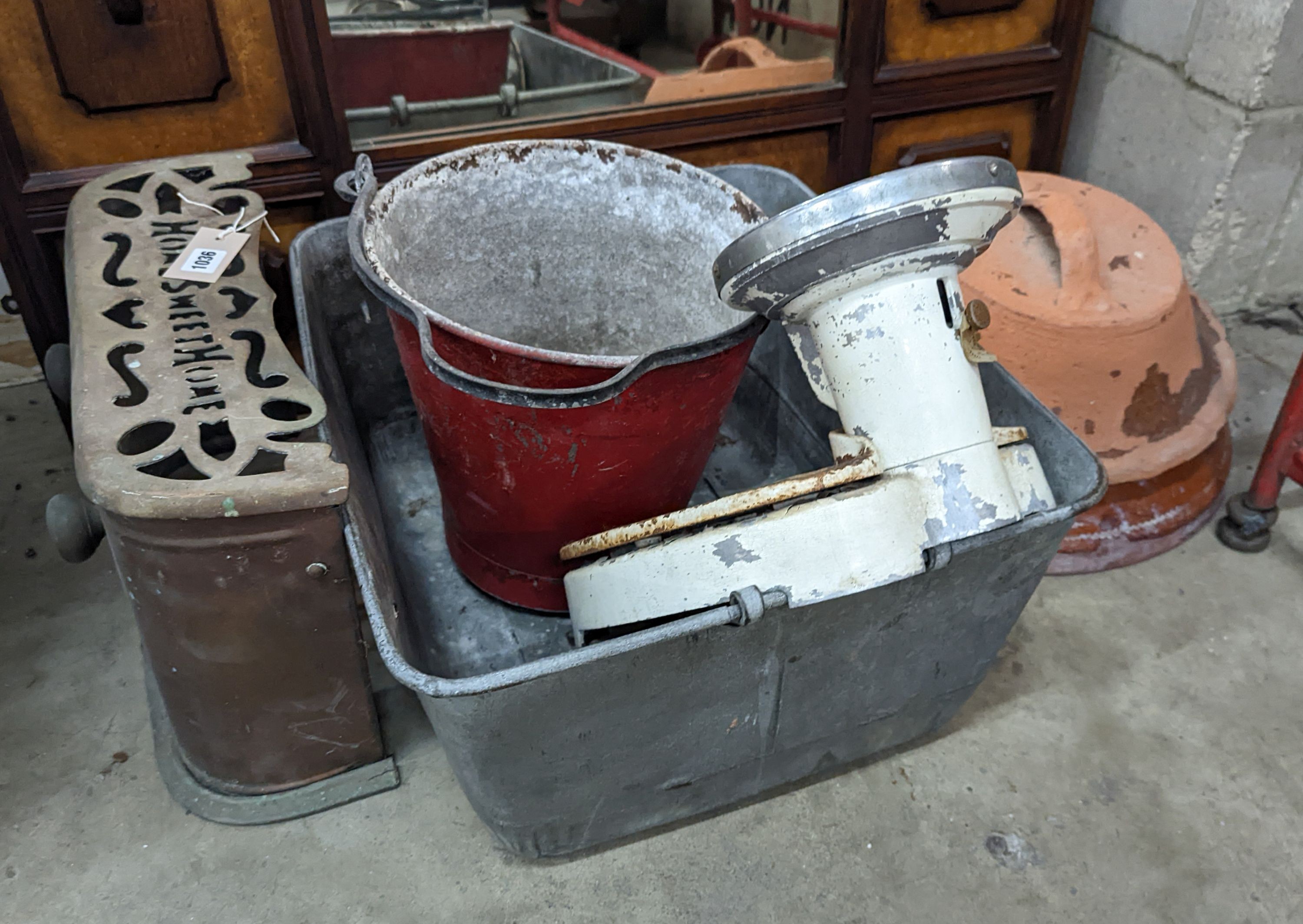 A rectangular galvanised tub, scales bucket, fender, etc.