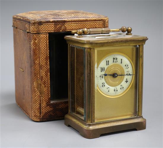 A carriage clock, case and key A carriage clock, case and key