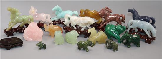 A collection of Chinese hardstone carvings and glass objects A collection of Chinese hardstone carvings and glass objects