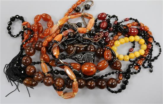 A quantity of assorted bead necklaces including agate and simulated amber etc. A quantity of assorted bead necklaces including agate and simulated amber etc.